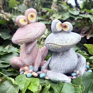 Detailed view of funny resin frog ornaments, perfect for indoor and outdoor garden decor.