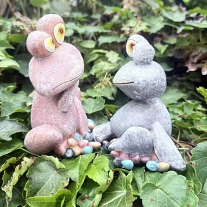 Quirky resin frog figurines for indoor outdoor garden decor, cute animal statues set of two.