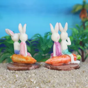 Cute mini rabbit carrot resin figurine detail shot, perfect for succulent plant micro decor.