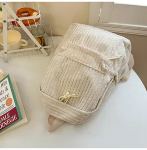 Casual solid color corduroy backpack for women, large capacity stylish daily school bookbag.