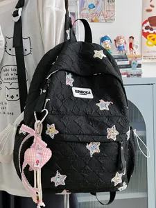 Sac à dos matelassé noir léger et décontracté pour femmes et étudiants avec des étoiles.
