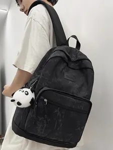 Stylish black backpack with bamboo pattern and cute panda pendant for daily use.