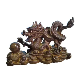 Resin Chinese dragon tea pet figurine with coins base, detail view for desk decor.