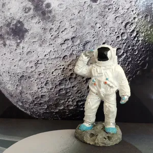 Astronaut figurine resin space desktop ornament moon base toy detail view for room decor.