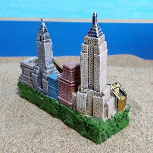 Detailed view of New York skyline resin pen holder, showcasing iconic architectural models.