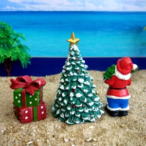Miniature Christmas tree Santa Claus and gift box resin figurines set for sand tray toy decor.