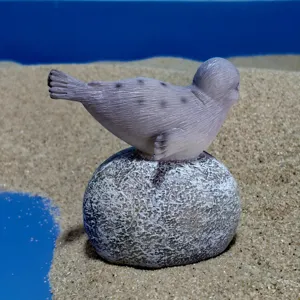 Miniature resin seal figurine detail shot, perfect for sand tray therapy and micro landscapes.