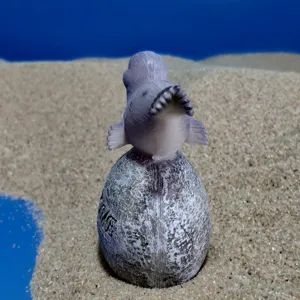 Resin seal figurine detail shot, cute marine animal sand table toy ornament showing texture.