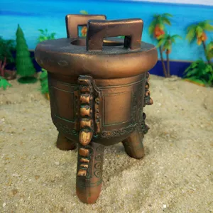 Detailed view of antique bronze style tripod ding resin ornament incense burner sand tray toy.
