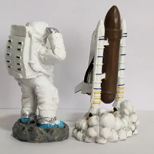 Detail view of the space shuttle and astronaut figurine set, perfect for sand tray games & decor.
