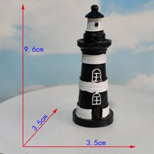 Detailed view of black and white resin lighthouse ornament showing precise dimensions and fine details.