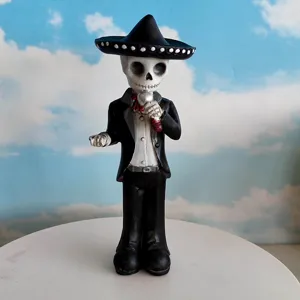 Close-up detail of a skeleton mariachi singer figurine, perfect for Halloween home decor.