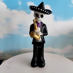 Detailed view of the skeleton musician figurine playing saxophone, perfect for Halloween decor.