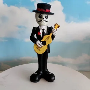 Detailed view of resin skeleton musician figurine with top hat and guitar for Halloween decor.