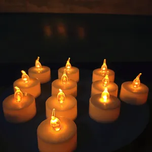 LED electronic tea light candles, warm yellow glowing lights for romantic party decoration.