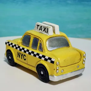 New York yellow taxi car detail view, miniature model business card holder and desktop decor.