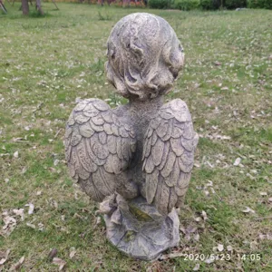 Garden angel figurine stone texture outdoor courtyard lawn decoration statue back view