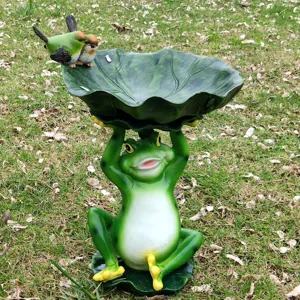 Resin frog bird feeder statue, lotus leaf bowl garden ornament for outdoor yard decoration.