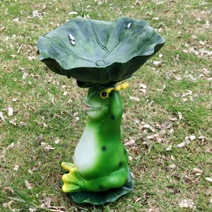 Garden frog bird feeder resin ornament, cute frog holding lotus leaf for outdoor yard decor.