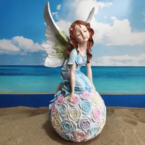Resin angel fairy garden figurine sitting on colorful rose flower ball outdoor yard decor