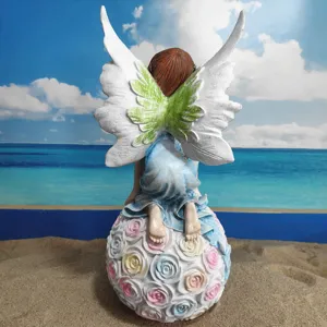 Garden angel fairy figurine sitting on a rose flower ball outdoor yard decor sculpture
