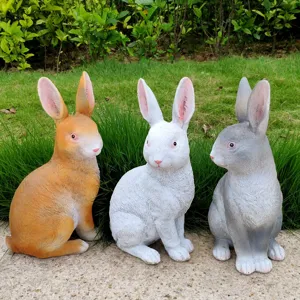 Resin rabbit statues for garden decoration, cute animal ornaments for outdoor lawn yard display.
