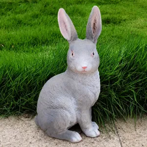 Detailed view of grey resin rabbit garden statue, realistic outdoor yard ornament and decor.