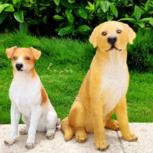 Detailed view of resin dog statues, featuring realistic puppy and labrador design for garden decor.