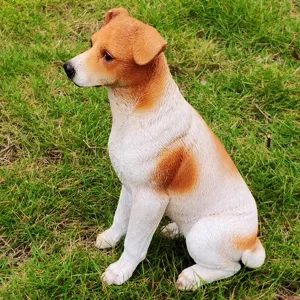 Resin dog statue detail garden ornament outdoor lawn decoration cute puppy figurine close up