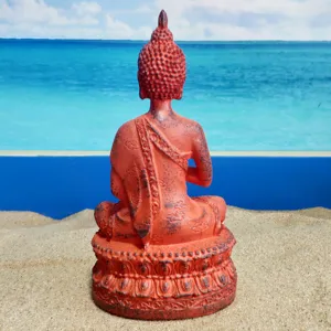 Thai Sakyamuni Buddha resin statue, vintage red copper finish meditation decor detail view.