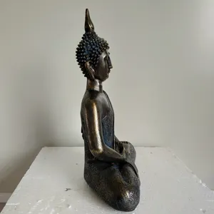 Side view detail of Thai Buddha resin statue figurine sculpture home office decor bronze finish