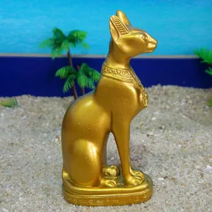 Exquisite golden Egyptian Bastet cat goddess resin figurine, detailed craft decor for home.