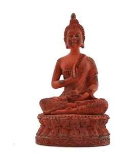Detailed view of a Thai Buddha statue resin handicraft in antique copper finish.