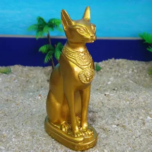 Detail shot of golden Egyptian cat Bastet resin figurine ornament, showcasing exquisite collar carving.