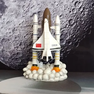 Space shuttle rocket model ornament, desktop display toy with launch smoke base and CNSA logo.