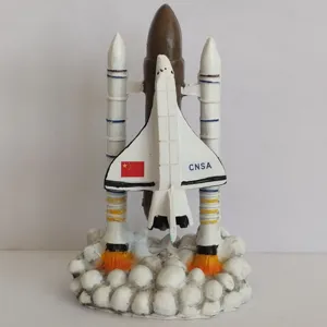 Detailed view of the space shuttle model with boosters and smoke base, desktop toy decoration.