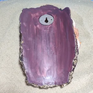 Detailed view of the resin animal wall hanging back structure with a sturdy metal hook.