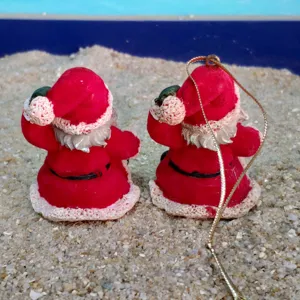 Christmas Santa Claus resin figurine ornament with gold hanging string for holiday decor