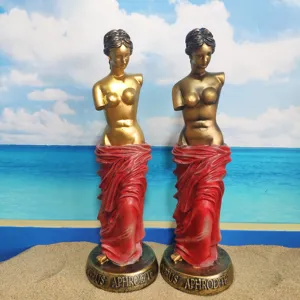 Resin Aphrodite goddess statue with golden torso and red draped base, exquisite craftsmanship.