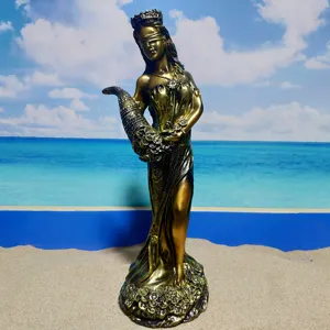Goddess of Fortune resin statue with cornucopia, golden prosperity decor ornament for home.