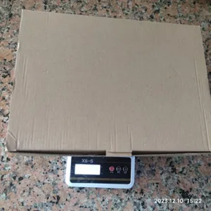 Detailed view of the product packaging box, showing sturdy corrugated cardboard design.