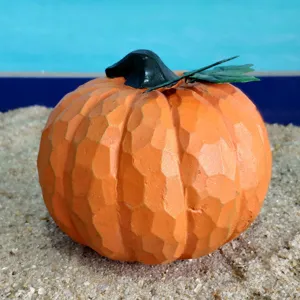 Halloween pumpkin resin ornament close-up view, detailed carved texture, perfect festive decor.