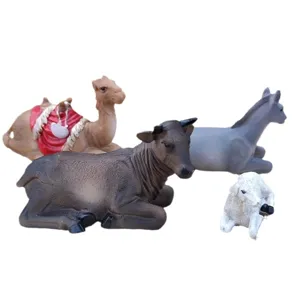 Resin animal figurines set including camel ox donkey and sheep for religious decor display.