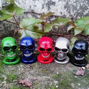 Miniature colorful resin skull figurines set of five, perfect for Halloween and sandbox props.