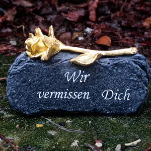 Memorial grave stone with golden rose decor, emotional tribute ornament for outdoor cemetery use.
