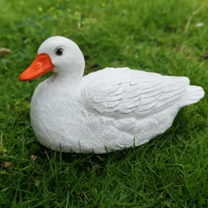 Detailed view of a cute white resin duck figurine, perfect for garden and home desktop decor.