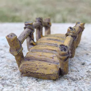 Detail shot of miniature resin wood bridge model for sand tray therapy and micro landscape decor.