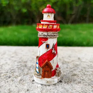 Resin lighthouse ornament detail, Mediterranean nautical decor for aquarium and sand table.