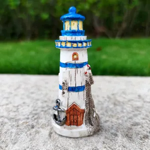 Mediterranean lighthouse resin figurine, miniature fish tank and home decor ornament.