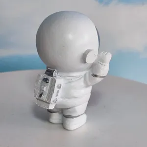 Cute astronaut figurine for desk decoration cake topper mini space man sculpture ornament gift.